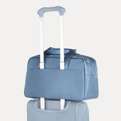 VersaPack®+ Underseat Tote - Elemental Blue attached to handle